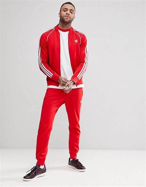 fake adidas tracksuit red white|adidas originals tracksuit red.